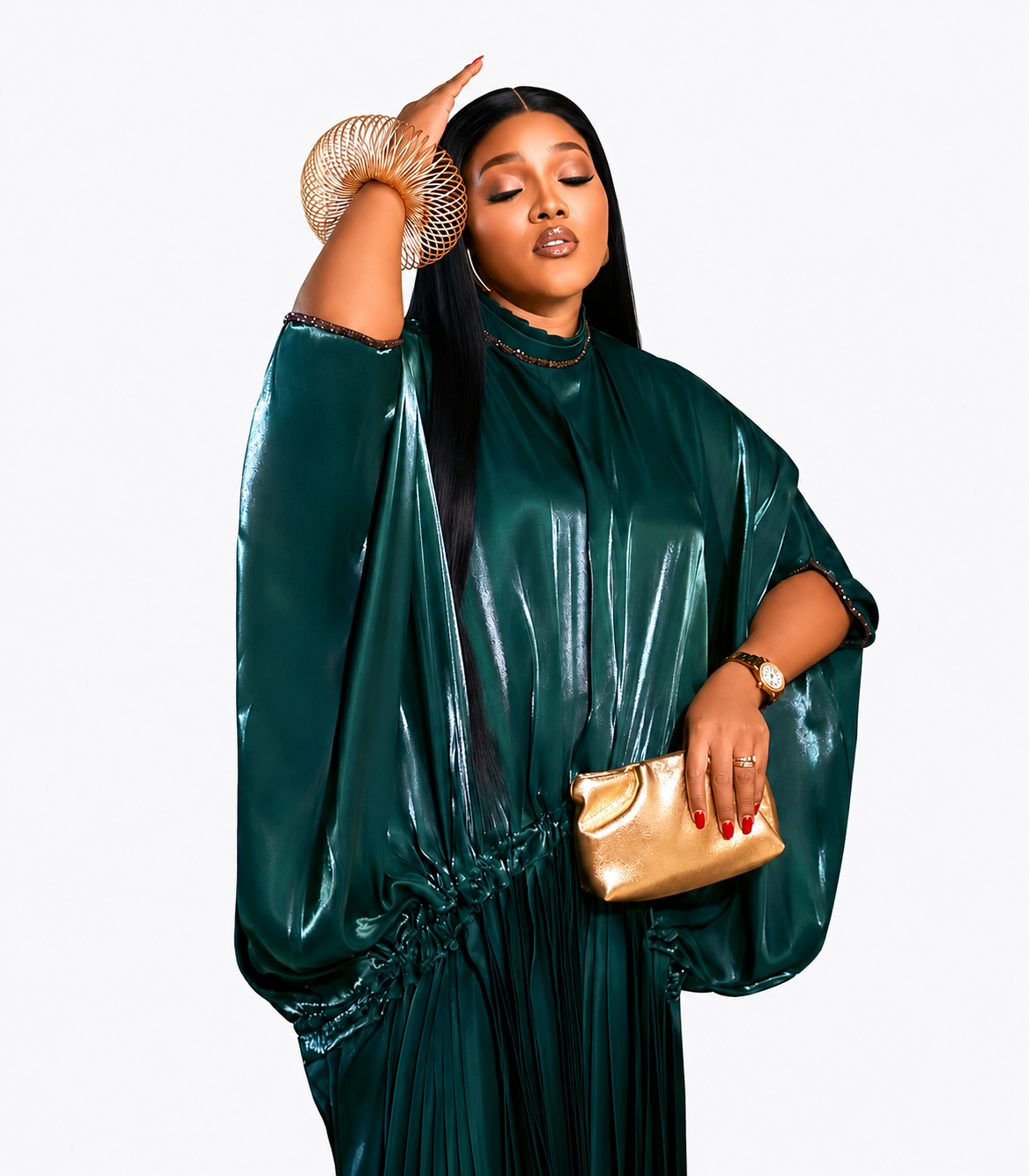 Model wearing an emerald satin gown with gold accessories